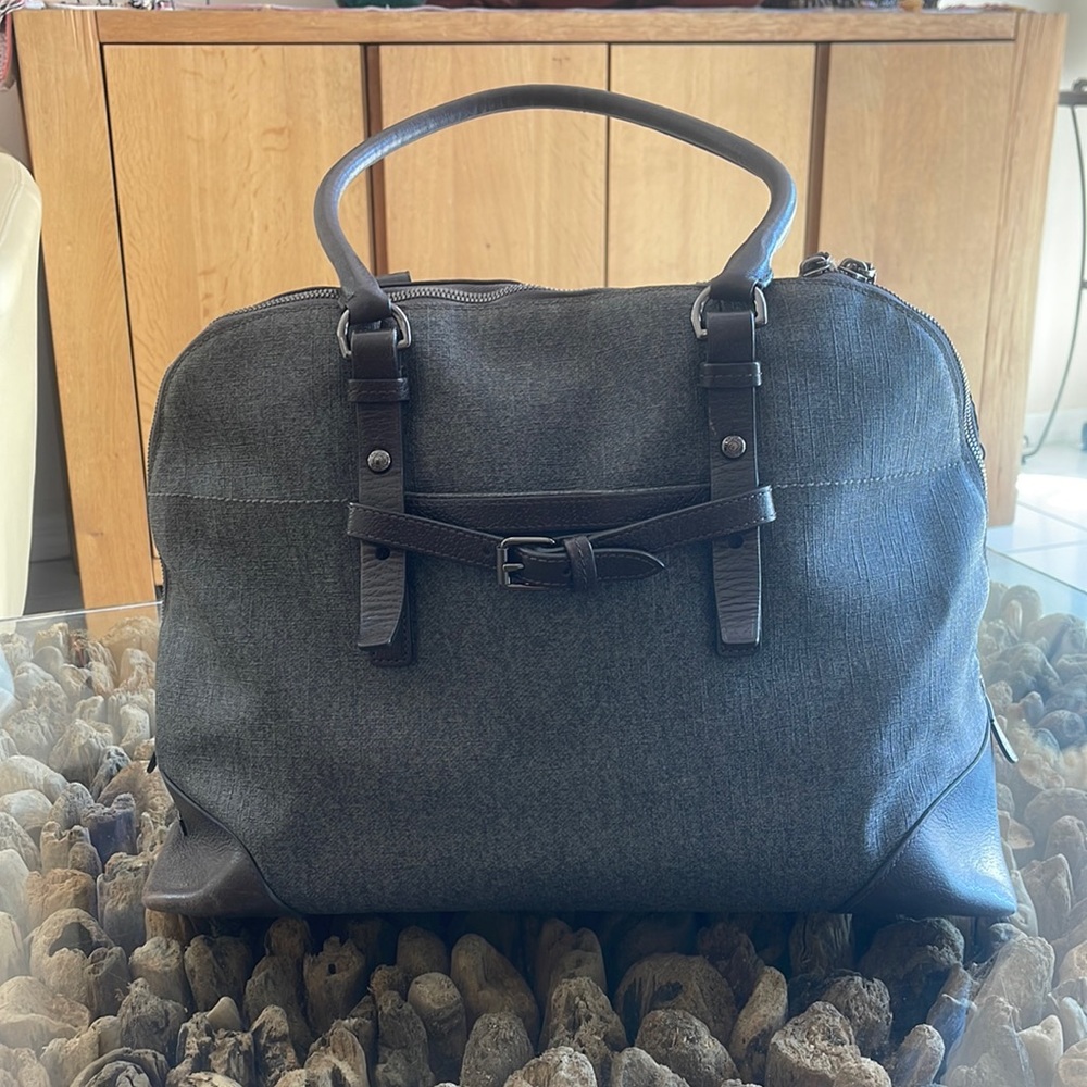 TUMI embossed canvas and leather shoulder bag
